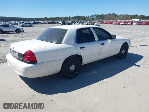 ✅ 2011 Ford Police Interceptor • VIN: 2FABP7BV0BX166552 • Lot: 41809067. Wystawiony na IAAI z przebiegiem 165 668 mil. Bezpłatny archiwum sprzedaży aukcyjnych z USA i szczegółowy raport historii pojazdu na DreamBid. Zdjęcie 4.