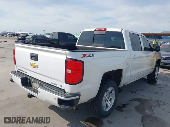 ✅ 2018 Chevrolet Silverado 1500 LT • VIN: 3GCUKREC6JG628189 • Lot: 44650376. Wystawiony na IAAI z przebiegiem 121 978 mil. Bezpłatny archiwum sprzedaży aukcyjnych z USA i szczegółowy raport historii pojazdu na DreamBid. Zdjęcie 4.