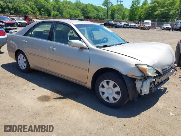 ✅ 2003 Toyota Camry XLE • VIN: JTDBE32K730165803 • Лот: 45282200. Опубліковано раніше на IAAI з пробігом 157 432 миль. Безкоштовний доступ до архіву аукціонних продажів зі США та докладний звіт про історію автомобіля на DreamBid. Зображення 1.