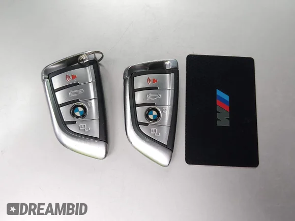 ✅ 2021 BMW X6 M • VIN: 5YMCY0C08M9E18335 • Lot: 43817464. Wystawiony na IAAI z przebiegiem 56 859 mil. Bezpłatny archiwum sprzedaży aukcyjnych z USA i szczegółowy raport historii pojazdu na DreamBid. Zdjęcie 11.
