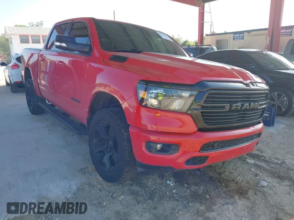 ✅ 2021 Ram 1500 Big Horn • VIN: 1C6RREFT2MN574093 • Lot: 42261388. Listed on IAAI with 76,703 mi. Free auction sales archive from the USA and detailed vehicle history report at DreamBid. Image 1.