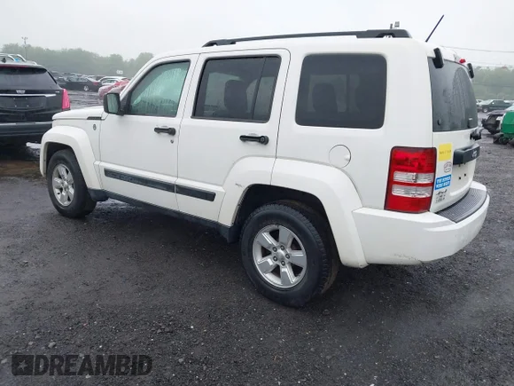 ✅ 2009 Jeep Liberty Sport • VIN: 1J8GN28K39W513960 • Lot: 42366855. Listed on IAAI with 122,403 mi. Free auction sales archive from the USA and detailed vehicle history report at DreamBid. Image 3.