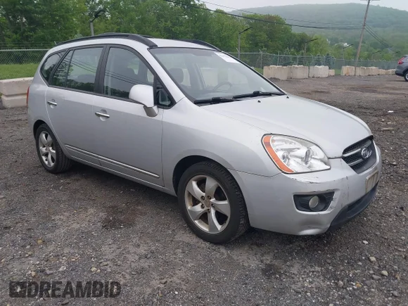 ✅ 2008 Kia Rondo LX • VIN: KNAFG525987171342 • Лот: 42271388. Опубліковано раніше на IAAI з пробігом 138 243 миль. Безкоштовний доступ до архіву аукціонних продажів зі США та докладний звіт про історію автомобіля на DreamBid. Зображення 1.