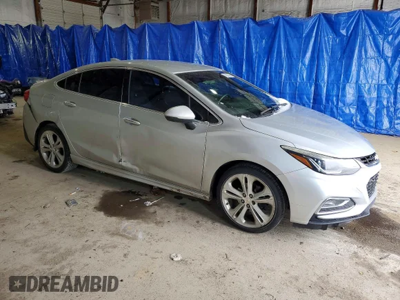 ✅ 2017 Chevrolet Cruze Premier • VIN: 1G1BF5SM0H7198224 • Лот: 78307365. Опубліковано раніше на Copart з пробігом 143 486 миль. Безкоштовний доступ до архіву аукціонних продажів зі США та докладний звіт про історію автомобіля на DreamBid. Зображення 4.