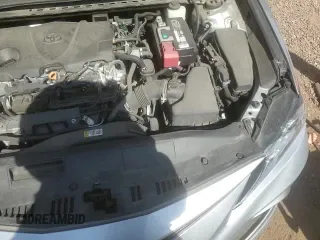 2021 Toyota Camry LE z VIN 4T1C11BK3MU023555, wystawiony jako Copart lot #63552925 z przebiegiem 54 924 mil mil oraz Szkoda całkowita • Salvage title. Historia ofert i sprzedaży dostępna na DreamBid. Obrazek 13.