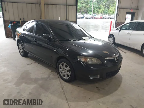 ✅ 2009 Mazda 3 i Touring Value • VIN: JM1BK32FX91190466 • Lot: 42362449. Listed on IAAI with 110,671 mi. Free auction sales archive from the USA and detailed vehicle history report at DreamBid. Image 1.