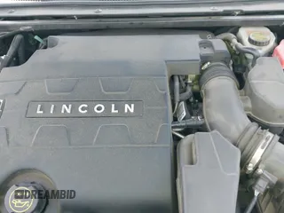 ✅ 2014 Lincoln MKS • VIN: 1LNHL9EK1EG606152 • Lot: 42104079. Listed on IAAI with 165,034 mi. Free auction sales archive from the USA and detailed vehicle history report at DreamBid. Image 19.