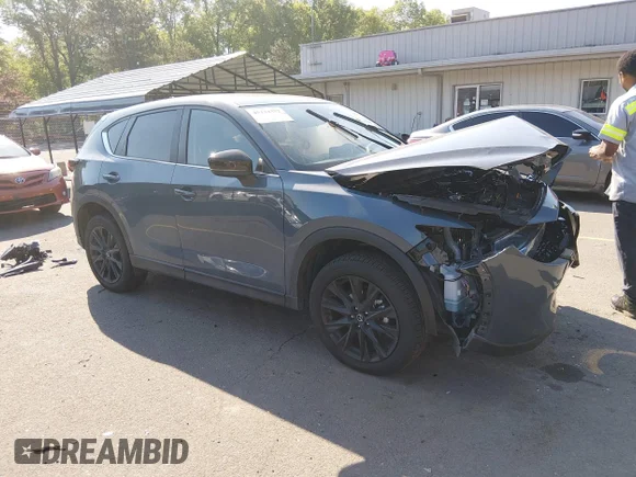 ✅ 2025 Mazda CX-5 S Carbon Edition • VIN: JM3KFBCMXS0717274 • Lot: 45132352. Listed on IAAI with 1,907 mi. Free auction sales archive from the USA and detailed vehicle history report at DreamBid. Image 1.