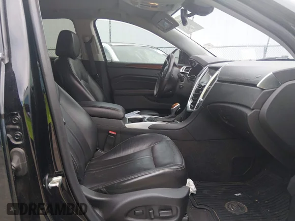 ✅ 2016 Cadillac SRX Premium Collection • VIN: 3GYFNDE30GS525286 • Лот: 45241171. Опубліковано раніше на IAAI з пробігом 77 692 миль. Безкоштовний доступ до архіву аукціонних продажів зі США та докладний звіт про історію автомобіля на DreamBid. Зображення 5.