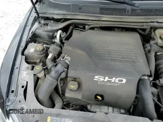 ✅ 2018 Ford Taurus SHO • VIN: 1FAHP2KT4JG127026 • Lot: 57410715. Listed on Copart with 56,728 mi. Free auction sales archive from the USA and detailed vehicle history report at DreamBid. Image 13.