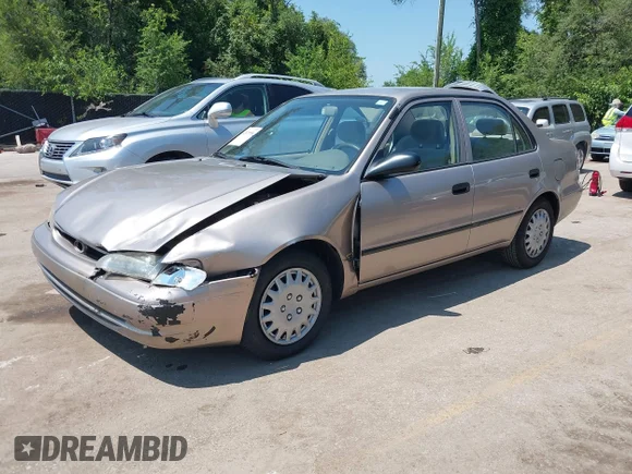 ✅ 1998 Toyota Corolla VE • VIN: 1NXBR12E8WZ059467 • Lot: 42921956. Listed on IAAI with 152,816 mi. Free auction sales archive from the USA and detailed vehicle history report at DreamBid. Image 2.