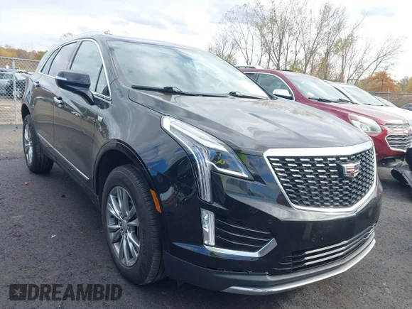 ✅ 2022 Cadillac XT5 AWD Premium Luxury • VIN: 1GYKNDRS5NZ111792 • Лот: 43562041. Опубликован ранее на IAAI с пробегом 74 020 миль. Бесплатный доступ к архиву аукционных продаж из США и подробный отчёт об истории автомобиля на DreamBid. Изображение 1.