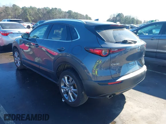 ✅ 2020 Mazda CX-30 Premium • VIN: 3MVDMAEM0LM103474 • Lot: 44057284. Listed on IAAI with 76,986 mi. Free auction sales archive from the USA and detailed vehicle history report at DreamBid. Image 3.