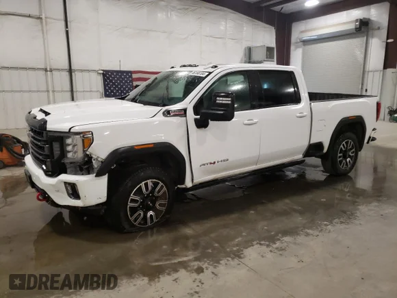 ✅ 2021 GMC Sierra 3500HD AT4 • VIN: 1GT49VEY1MF214310 • Лот: 46166104. Опубликован ранее на Copart с пробегом 94 081 миль. Бесплатный доступ к архиву аукционных продаж из США и подробный отчёт об истории автомобиля на DreamBid. Изображение 1.