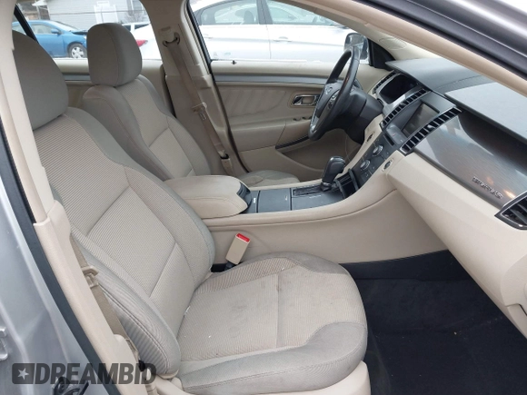 ✅ 2015 Ford Taurus SEL • VIN: 1FAHP2E96FG105293 • Lot: 43966634. Wystawiony na IAAI z przebiegiem 86 519 mil. Bezpłatny archiwum sprzedaży aukcyjnych z USA i szczegółowy raport historii pojazdu na DreamBid. Zdjęcie 5.