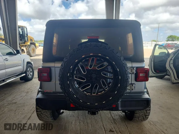 ✅ 2021 Jeep Wrangler Unlimited Willys Sport • VIN: 1C4HJXDN9MW618497 • Лот: 79984215. Опубліковано раніше на Copart з пробігом 60 247 миль. Безкоштовний доступ до архіву аукціонних продажів зі США та докладний звіт про історію автомобіля на DreamBid. Зображення 6.