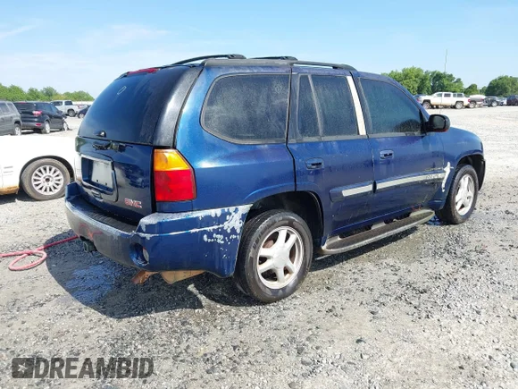 ✅ 2003 GMC Envoy SLE • VIN: 1GKDS13S032346173 • Lot: 42142925. Wystawiony na IAAI z przebiegiem 304 447 mil. Bezpłatny archiwum sprzedaży aukcyjnych z USA i szczegółowy raport historii pojazdu na DreamBid. Zdjęcie 4.
