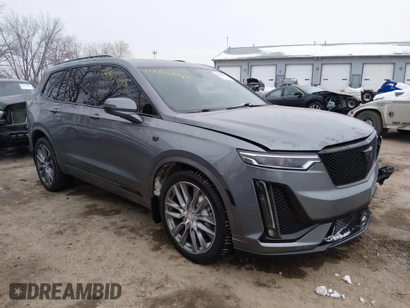 ✅ 2021 Cadillac XT6 Sport • VIN: 1GYKPHRS9MZ124223 • Lot: 44303045. Listed on IAAI with 49,869 mi. Free auction sales archive from the USA and detailed vehicle history report at DreamBid. Image 1.