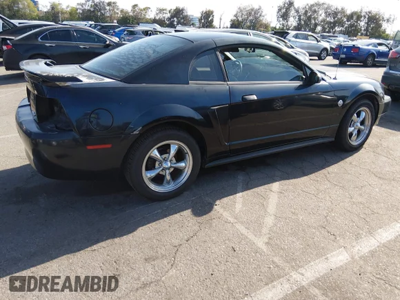 ✅ 2004 Ford Mustang Standard • VIN: 1FAFP40674F193029 • Lot: 44903363. Listed on IAAI with 69,911 mi. Free auction sales archive from the USA and detailed vehicle history report at DreamBid. Image 4.