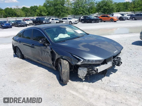 ✅ 2022 Kia K5 LXS • VIN: 5XXG14J20NG115707 • Лот: 42191113. Опубліковано раніше на IAAI з пробігом 36 222 миль. Безкоштовний доступ до архіву аукціонних продажів зі США та докладний звіт про історію автомобіля на DreamBid. Зображення 1.
