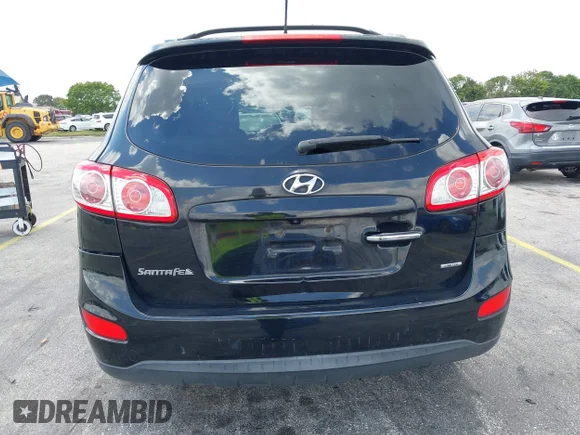 ✅ 2012 Hyundai Santa Fe Limited • VIN: 5XYZK4AG2CG167401 • Лот: 44615621. Опубліковано раніше на IAAI з пробігом 253 240 миль. Безкоштовний доступ до архіву аукціонних продажів зі США та докладний звіт про історію автомобіля на DreamBid. Зображення 6.