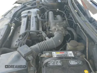 ✅ 1997 Mazda Protege DX • VIN: JM1BC1416V0132633 • Lot: 42162630. Wystawiony na IAAI z przebiegiem 234 300 mil. Bezpłatny archiwum sprzedaży aukcyjnych z USA i szczegółowy raport historii pojazdu na DreamBid. Zdjęcie 13.