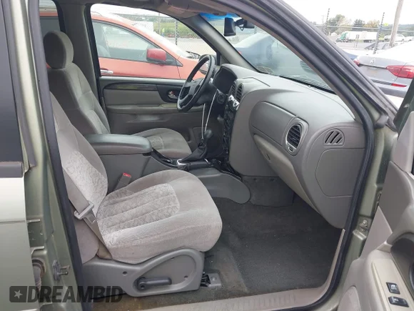 ✅ 2004 GMC Envoy SLT • VIN: 1GKDT13S142131805 • Lot: 43272881. Wystawiony na IAAI z przebiegiem 266 287 mil. Bezpłatny archiwum sprzedaży aukcyjnych z USA i szczegółowy raport historii pojazdu na DreamBid. Zdjęcie 5.