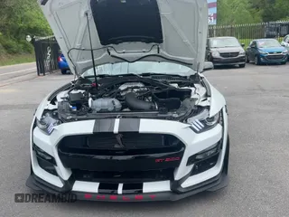 2020 Ford Mustang Shelby GT500 с VIN 1FA6P8SJ4L5501996, выставлен на аукционе Copart как лот 54199335 с пробегом 1 913 миль миль и Чистый • Clean title. История ставок и продаж доступна на DreamBid. Изображение 11.