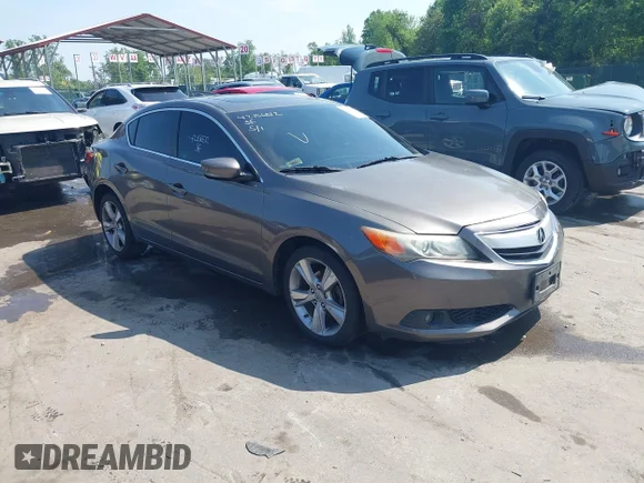 ✅ 2013 Acura ILX Premium • VIN: 19VDE1F53DE006702 • Лот: 42156512. Опубліковано раніше на IAAI з пробігом 169 634 миль. Безкоштовний доступ до архіву аукціонних продажів зі США та докладний звіт про історію автомобіля на DreamBid. Зображення 1.
