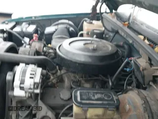 ✅ 1995 GMC Sierra 1500 • VIN: 1GTEC14H2SZ544694 • Lot: 43763734. Listed on IAAI with 135,037 mi. Free auction sales archive from the USA and detailed vehicle history report at DreamBid. Image 13.