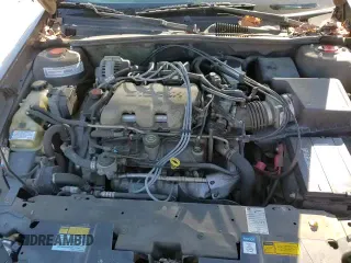 2000 Chevrolet Malibu LS z VIN 1G1NE52J4Y6303956, wystawiony jako Copart lot #83049134 z przebiegiem 146 425 mil mil oraz Czysty tytuł • Clean title. Historia ofert i sprzedaży dostępna na DreamBid. Obrazek 13.