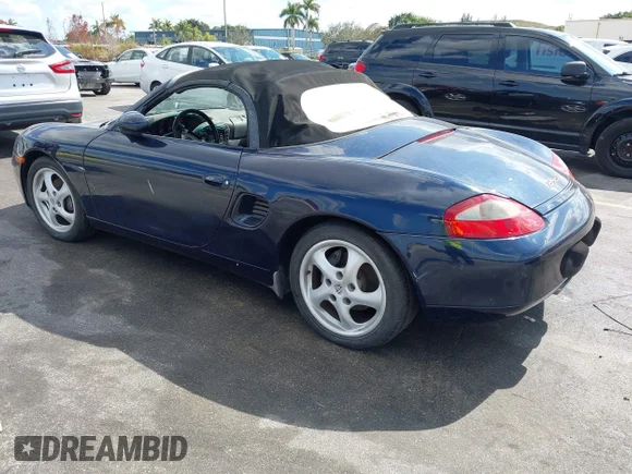 ✅ 1997 Porsche Boxster • VIN: WP0CA2980VS623371 • Лот: 44367300. Опубліковано раніше на IAAI з пробігом 64 564 миль. Безкоштовний доступ до архіву аукціонних продажів зі США та докладний звіт про історію автомобіля на DreamBid. Зображення 3.