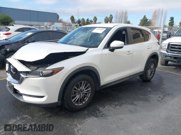 ✅ 2019 Mazda CX-5 Sport • VIN: JM3KFABM4K1699070 • Lot: 43990086. Listed on IAAI with 107,857 mi. Free auction sales archive from the USA and detailed vehicle history report at DreamBid. Image 18.