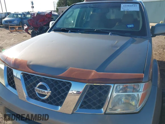 ✅ 2007 Nissan Pathfinder S • VIN: 5N1AR18W67C648441 • Lot: 42984543. Wystawiony na IAAI z przebiegiem 227 634 mil. Bezpłatny archiwum sprzedaży aukcyjnych z USA i szczegółowy raport historii pojazdu na DreamBid. Zdjęcie 6.