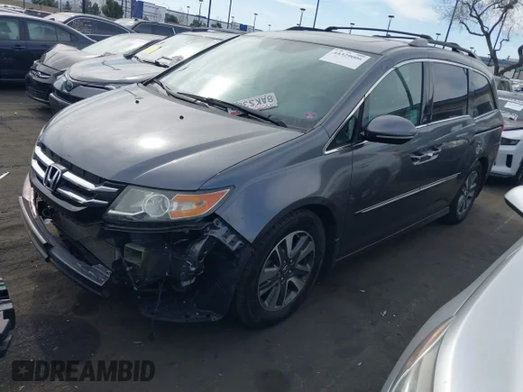 ✅ 2016 Honda Odyssey Touring Elite • VIN: 5FNRL5H97GB159706 • Lot: 44329006. Listed on IAAI with 115,519 mi. Free auction sales archive from the USA and detailed vehicle history report at DreamBid. Image 2.