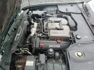 ✅ 2000 Jaguar XJ • VIN: SAJDA25BXYMF01667 • Лот: 41333495. Опубликован ранее на Copart с пробегом 102 291 миль. Бесплатный доступ к архиву аукционных продаж из США и подробный отчёт об истории автомобиля на DreamBid. Изображение 13.