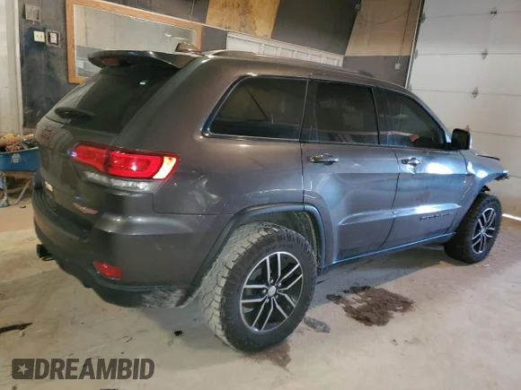 ✅ 2017 Jeep Grand Cherokee Trailhawk • VIN: 1C4RJFLGXHC948299 • Lot: 69616402. Wystawiony na Copart z przebiegiem 100 171 mil. Bezpłatny archiwum sprzedaży aukcyjnych z USA i szczegółowy raport historii pojazdu na DreamBid. Zdjęcie 3.