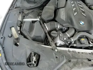 ✅ 2020 BMW 8 Series M850i xDrive • VIN: WBAFY4C01LCE00674 • Лот: 86701975. Опубликован ранее на Copart с пробегом 60 215 миль. Бесплатный доступ к архиву аукционных продаж из США и подробный отчёт об истории автомобиля на DreamBid. Изображение 13.