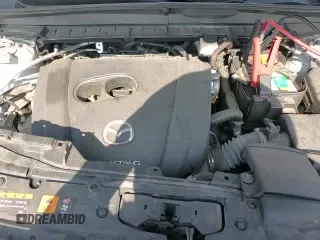 ✅ 2024 Mazda CX-50 S Select • VIN: 7MMVABAMXRN172035 • Lot: 91350135. Listed on Copart with 40,392 mi. Free auction sales archive from the USA and detailed vehicle history report at DreamBid. Image 16.