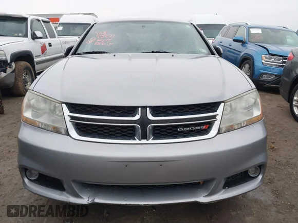 ✅ 2013 Dodge Avenger SXT • VIN: 1C3CDZCB5DN682454 • Lot: 41689501. Listed on IAAI with 192,813 mi. Free auction sales archive from the USA and detailed vehicle history report at DreamBid. Image 6.