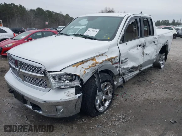 ✅ 2014 Ram 1500 Laramie • VIN: 1C6RR6JT2ES228982 • Lot: 41348028. Wystawiony na IAAI z przebiegiem 88 063 mil. Bezpłatny archiwum sprzedaży aukcyjnych z USA i szczegółowy raport historii pojazdu na DreamBid. Zdjęcie 2.