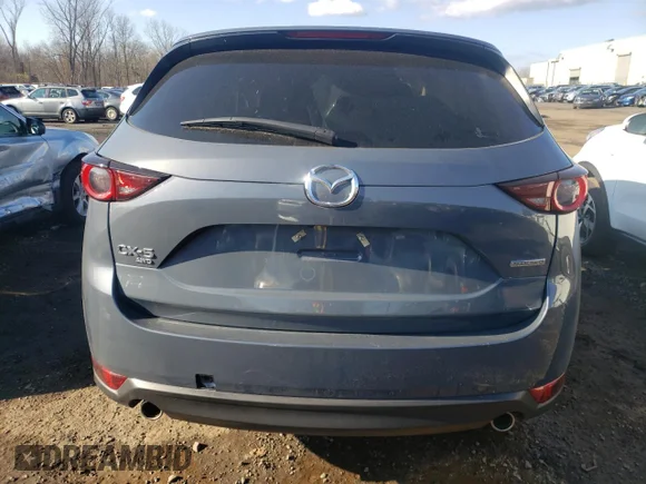 ✅ 2021 Mazda CX-5 Carbon Edition • VIN: JM3KFBCM6M0435796 • Lot: 67999572. Wystawiony na Copart z przebiegiem 25 328 mil. Bezpłatny archiwum sprzedaży aukcyjnych z USA i szczegółowy raport historii pojazdu na DreamBid. Zdjęcie 6.