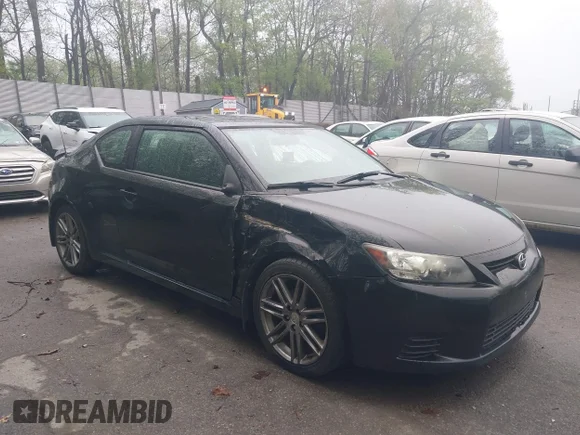✅ 2011 Scion tC • VIN: JTKJF5C79B3018581 • Lot: 42190803. Wystawiony na IAAI z przebiegiem 108 597 mil. Bezpłatny archiwum sprzedaży aukcyjnych z USA i szczegółowy raport historii pojazdu na DreamBid. Zdjęcie 1.