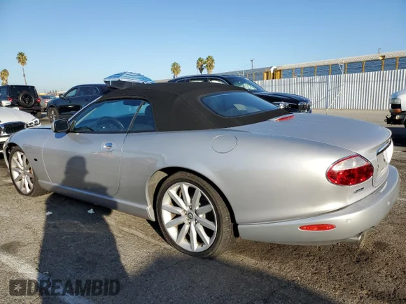 ✅ 2006 Jaguar XK XK8 • VIN: SAJDA42C462A44985 • Lot: 87110305. Listed on Copart with 70,292 mi. Free auction sales archive from the USA and detailed vehicle history report at DreamBid. Image 2.