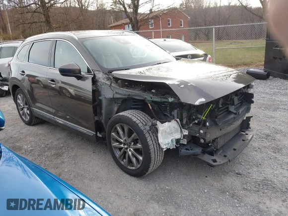 ✅ 2018 Mazda CX-9 Grand Touring • VIN: JM3TCBDY7J0229512 • Lot: 43937970. Wystawiony na IAAI z przebiegiem 139 855 mil. Bezpłatny archiwum sprzedaży aukcyjnych z USA i szczegółowy raport historii pojazdu na DreamBid. Zdjęcie 1.