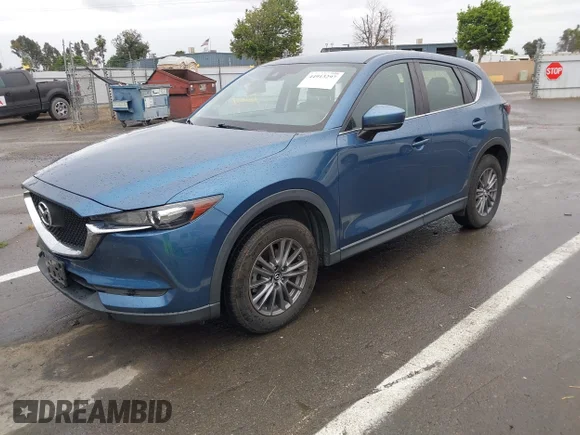 ✅ 2019 Mazda CX-5 Sport • VIN: JM3KFABM8K0690040 • Lot: 44913297. Listed on IAAI with 76,098 mi. Free auction sales archive from the USA and detailed vehicle history report at DreamBid. Image 2.