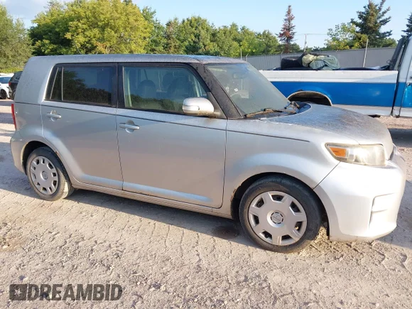 ✅ 2011 Scion xB • VIN: JTLZE4FE9B1128872 • Lot: 43113878. Listed on IAAI with 119,495 mi. Free auction sales archive from the USA and detailed vehicle history report at DreamBid. Image 1.