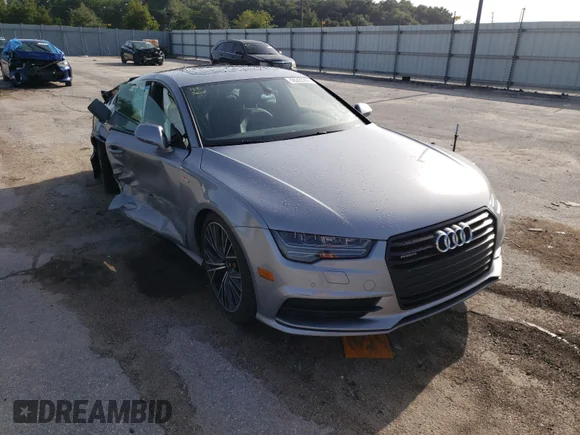 ✅ 2017 Audi A7 Premium Plus • VIN: WAUW2AFC4HN132346 • Лот: 55322701. Опубликован ранее на Copart с пробегом 38 079 миль. Бесплатный доступ к архиву аукционных продаж из США и подробный отчёт об истории автомобиля на DreamBid. Изображение 1.