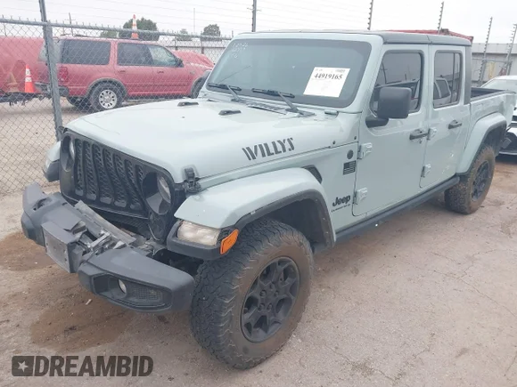 ✅ 2023 Jeep Gladiator Sport • VIN: 1C6HJTAG0PL545788 • Лот: 44919165. Опубліковано раніше на IAAI з пробігом 113 429 миль. Безкоштовний доступ до архіву аукціонних продажів зі США та докладний звіт про історію автомобіля на DreamBid. Зображення 2.