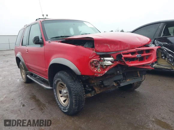 ✅ 1999 Ford Explorer Sport • VIN: 1FMYU22E0XUB73981 • Lot: 44540229. Listed on IAAI with 127,592 mi. Free auction sales archive from the USA and detailed vehicle history report at DreamBid. Image 1.